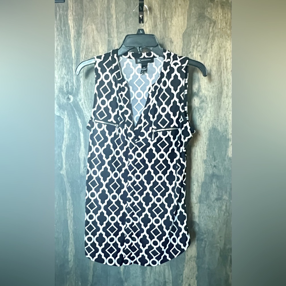 I•N•C International Concepts, Pull Over Black Top with a White Pattern. Size M.